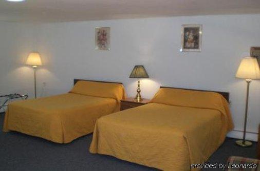 Budget Inn Wellsville Стая снимка